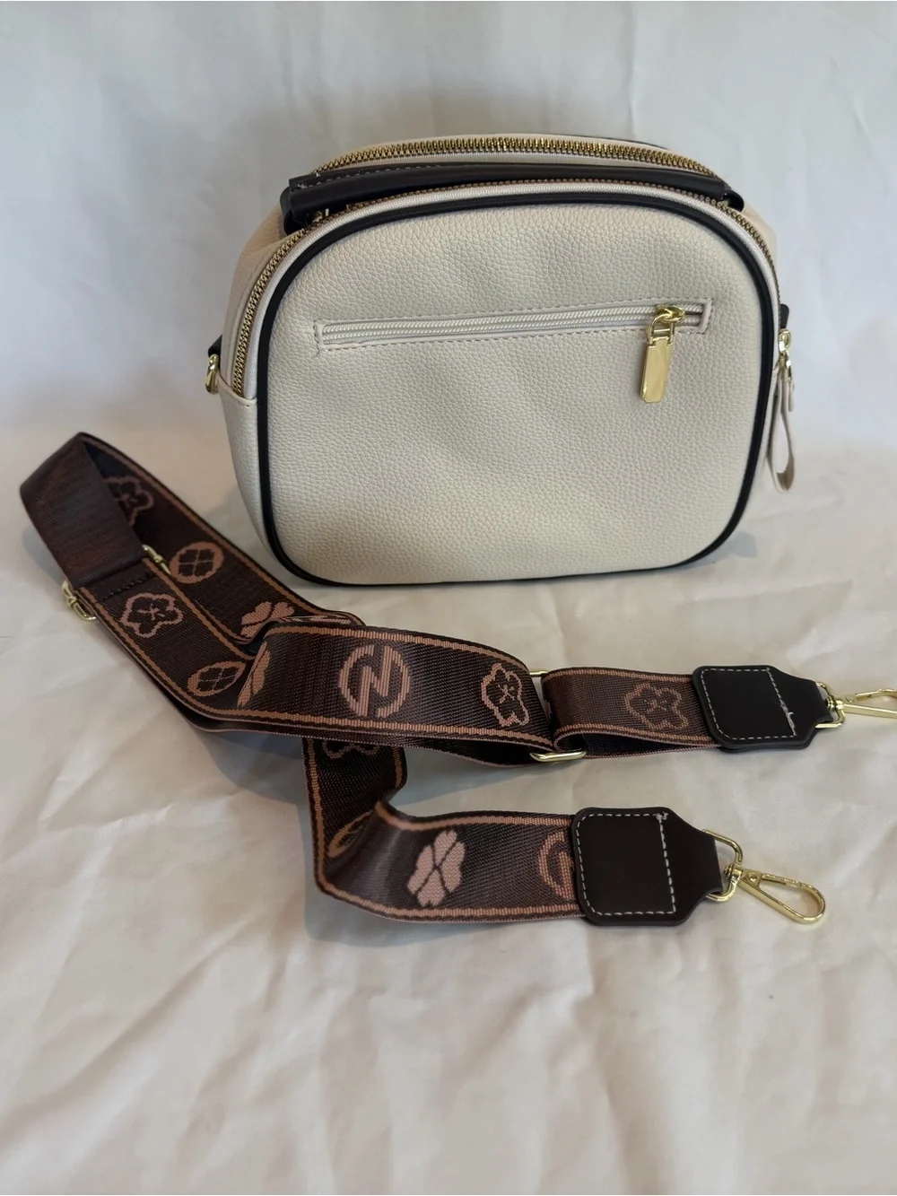 K-Emblem Tan Pebbled Leather Crossbody Bag with Patterned Strap